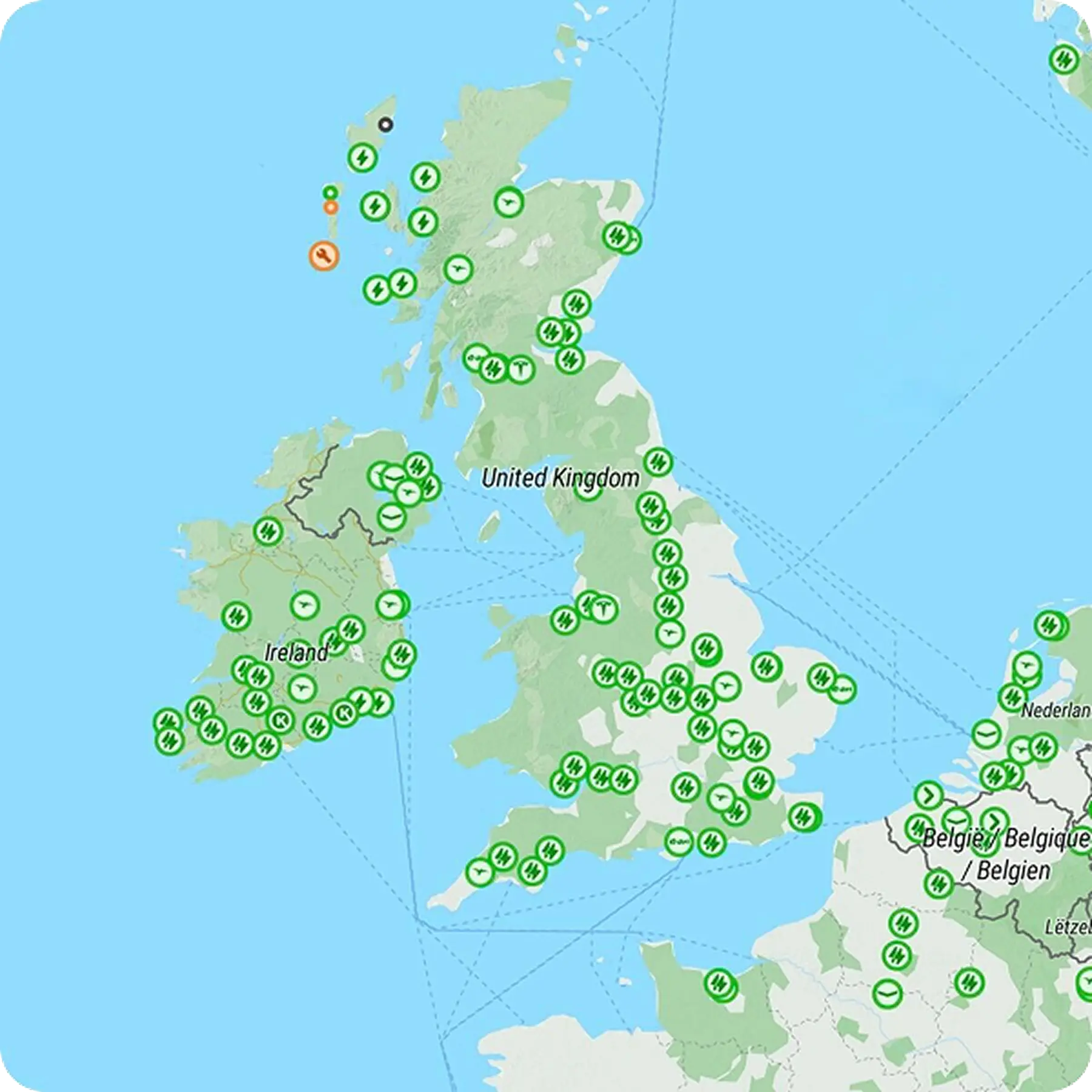 Rivian R1T driving through scenic landscape